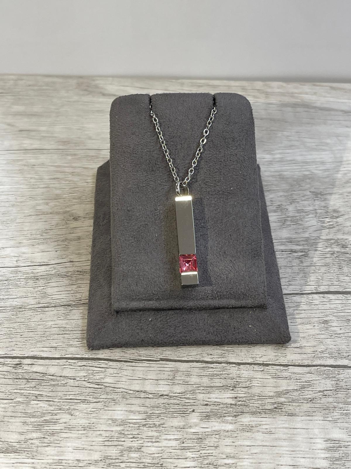 Obsequio de collar con las cenizas de tu mascota para incineración individual